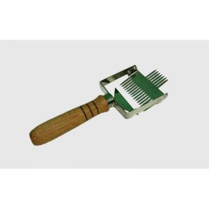 Вилка розкладачка для розпечатування сот